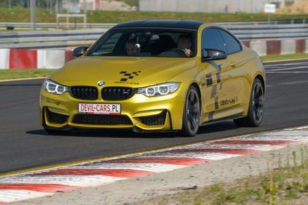 Driving behind the wheel of a BMW M4 on the track (2 laps)